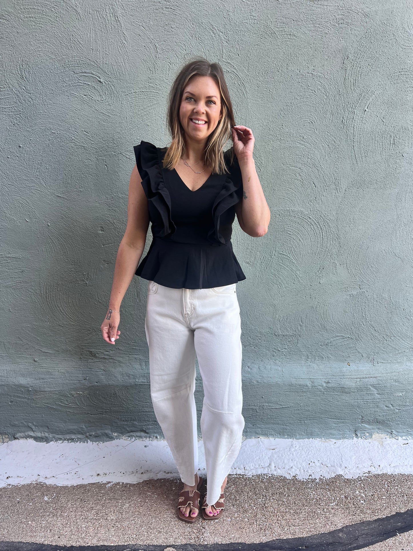 Black Sleeveless Ruffled Peplum Top