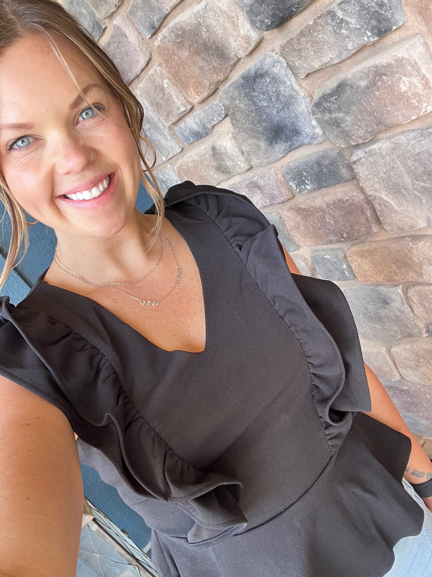 Black Sleeveless Ruffled Peplum Top