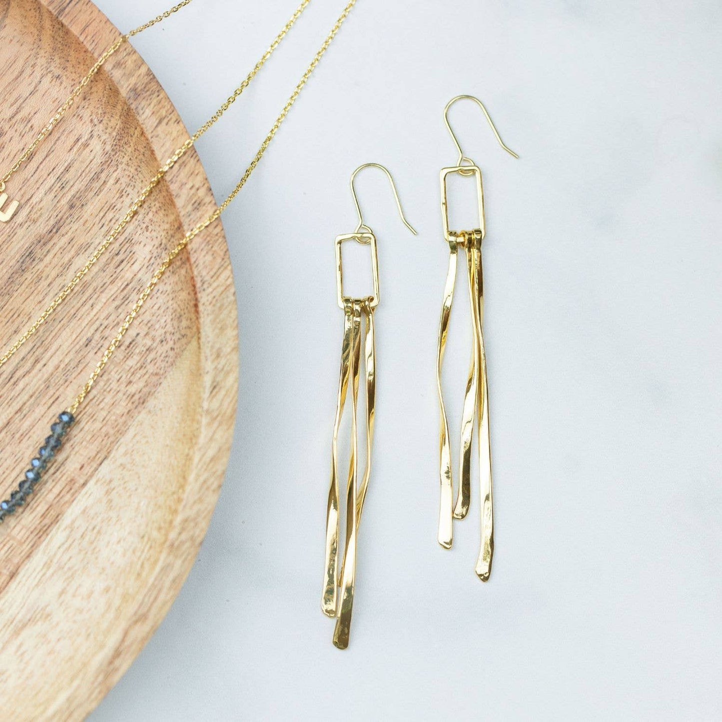 Long Swirl Earrings: Gold