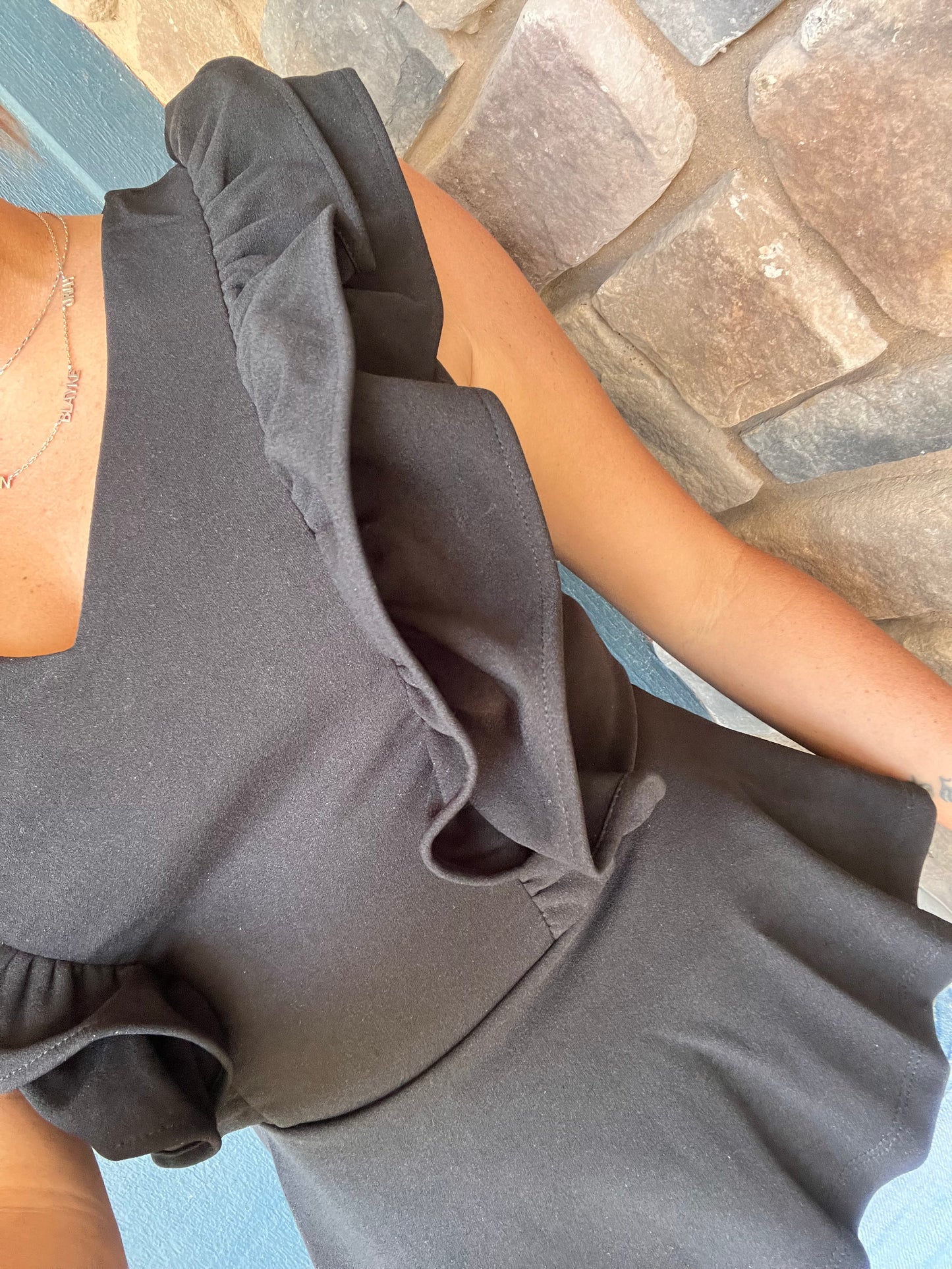 Black Sleeveless Ruffled Peplum Top