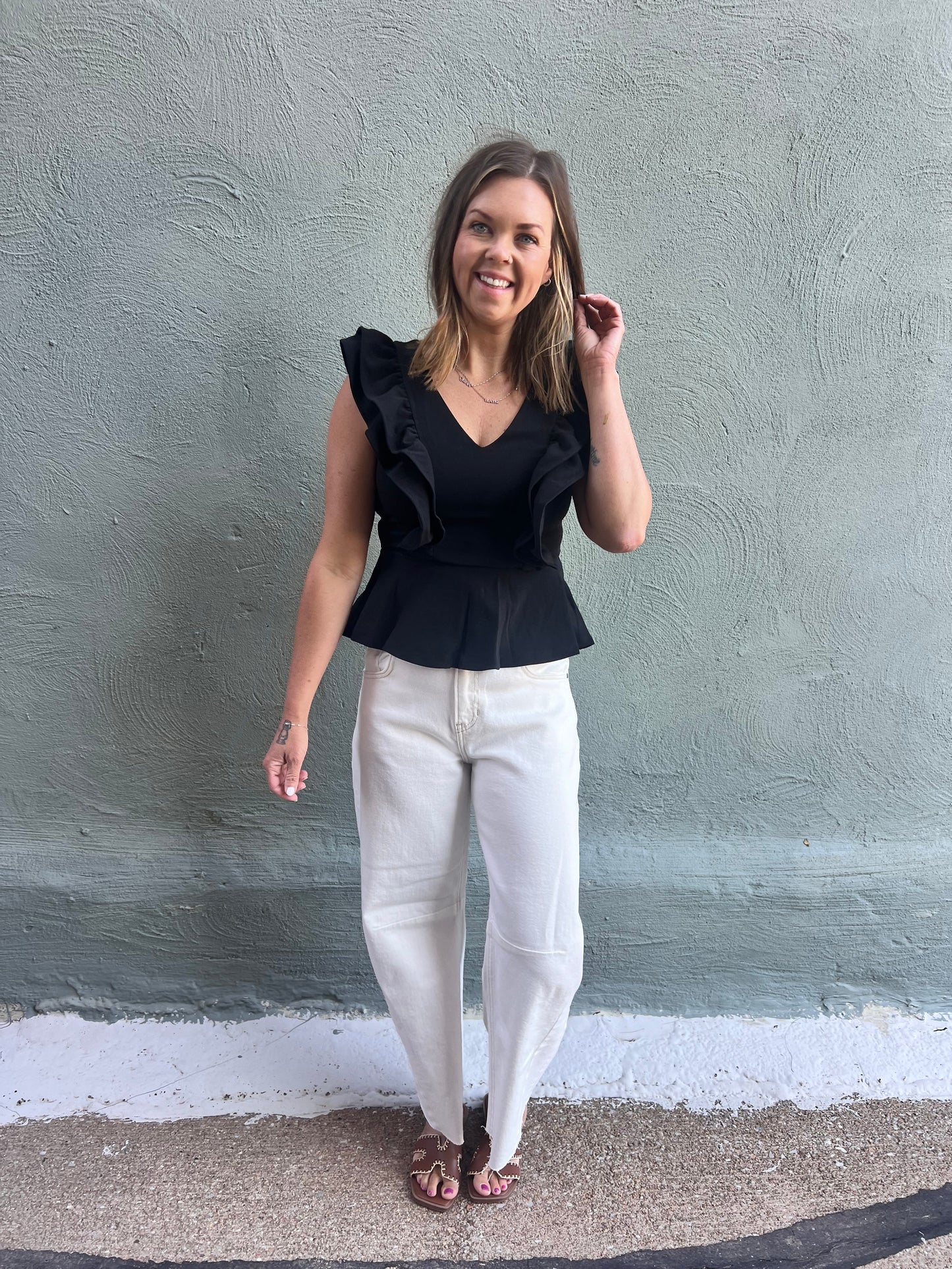 Black Sleeveless Ruffled Peplum Top