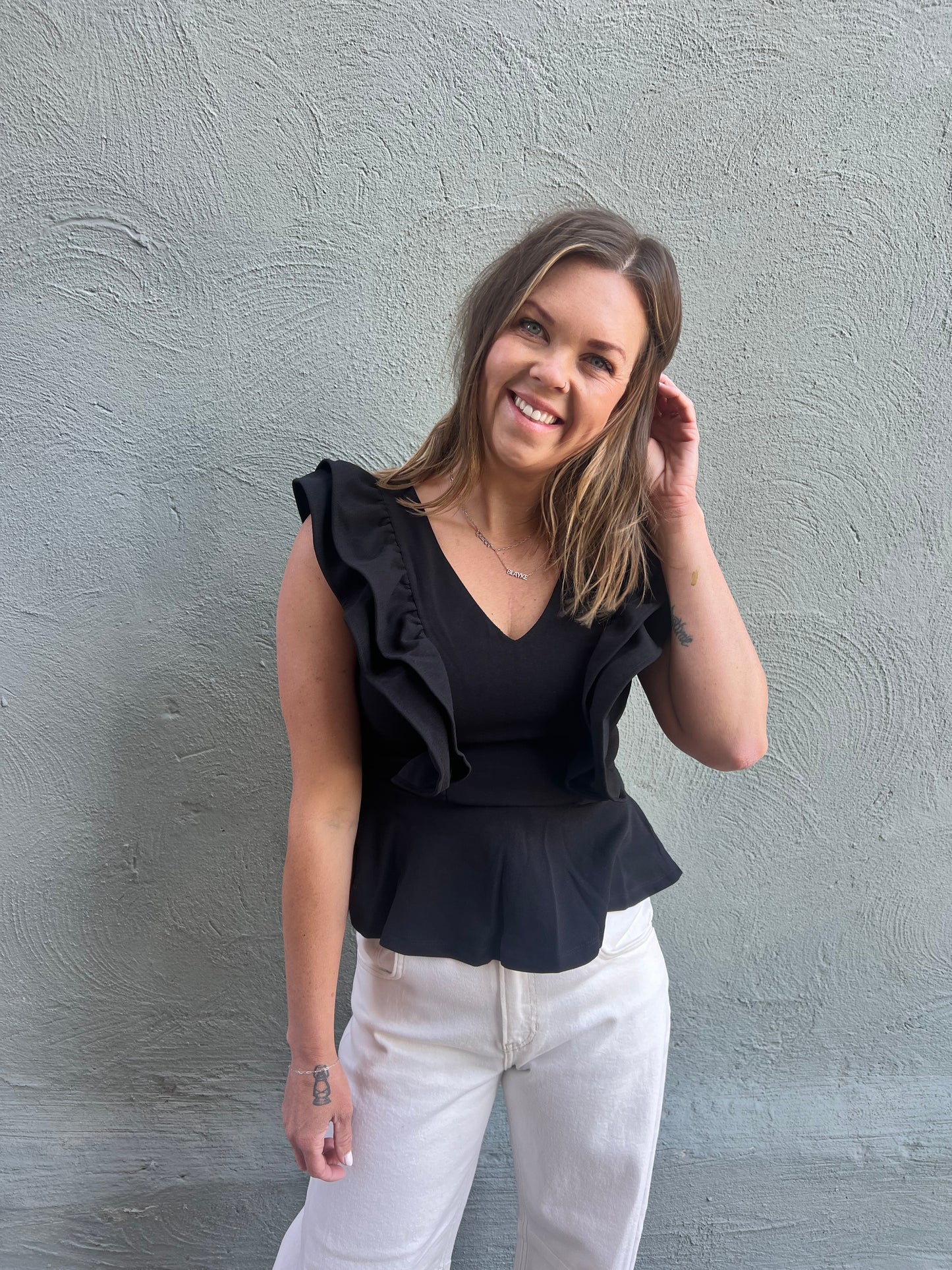 Black Sleeveless Ruffled Peplum Top