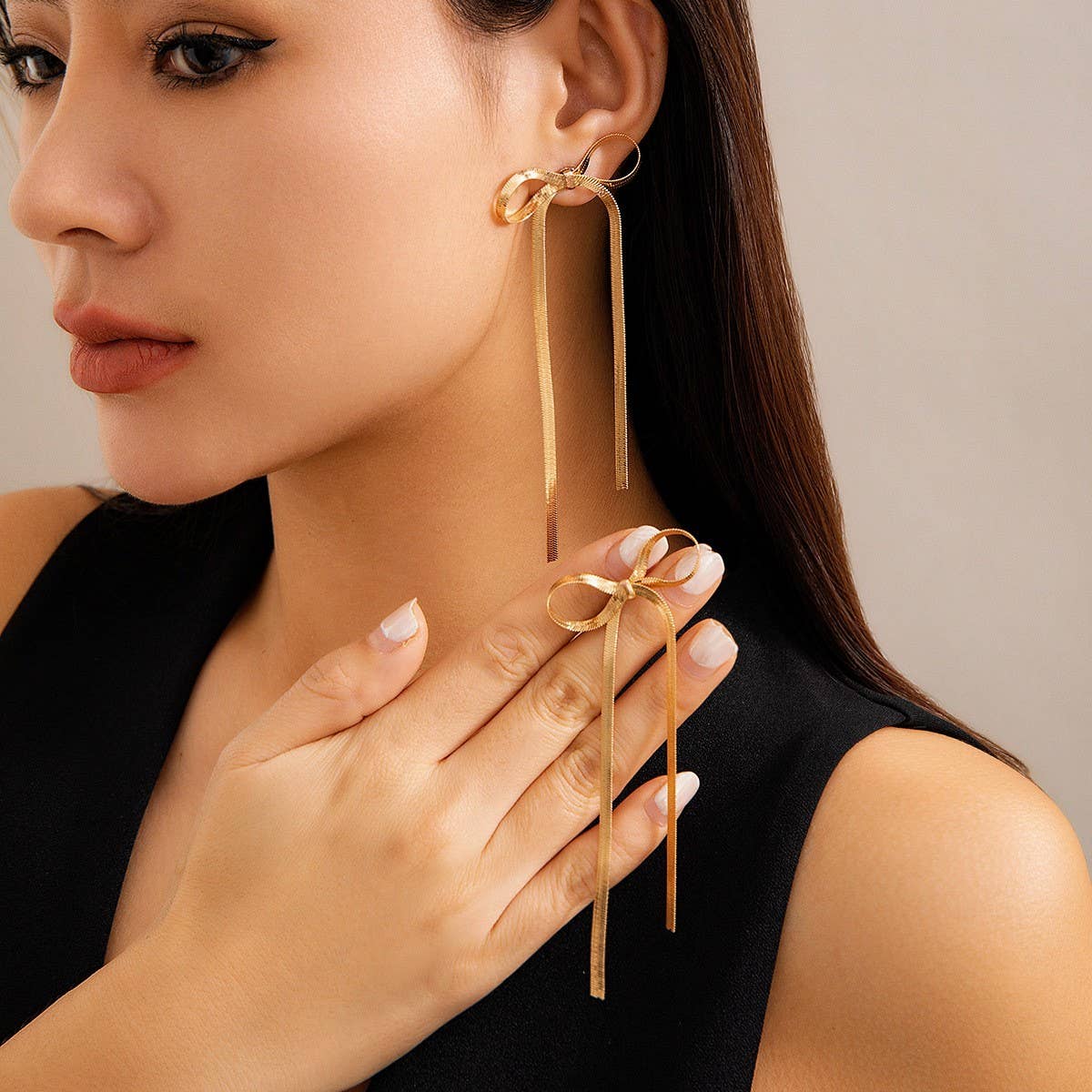 HERRINGBONE SNAKE CHAIN LONG BOW EARRINGS